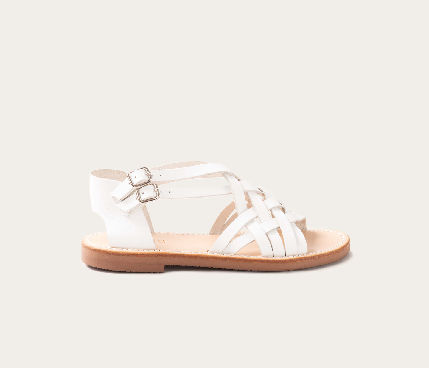 sandale blanches en cuir - sandales camarguaises blanches -sandale en cuir gras blanc pour femmes - nus pieds sandale femme - sandale femme en cuir blanc vue de profil