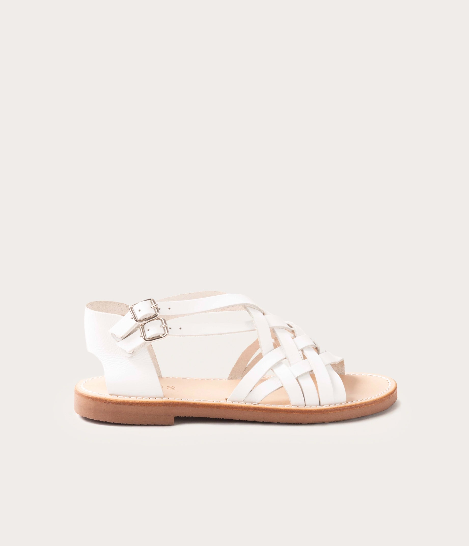 sandale blanches en cuir - sandales camarguaises blanches -sandale en cuir gras blanc pour femmes - nus pieds sandale femme - sandale femme en cuir blanc vue de profil