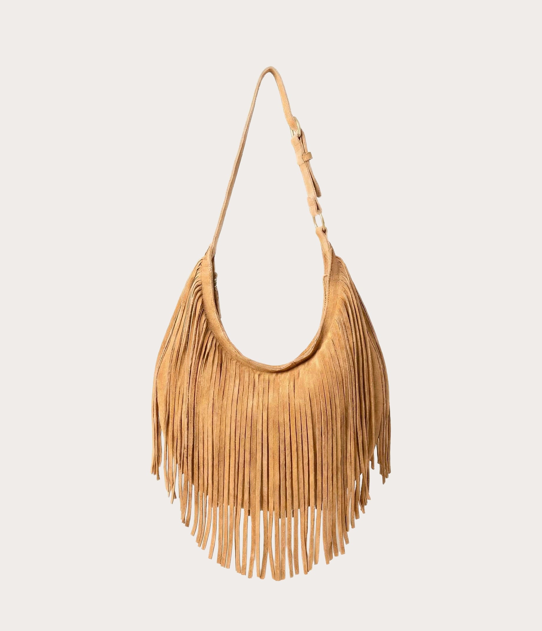 sac felix a franges havane porté, sac en cuir, sac à franges, sac frange femme, sac artisanal, sac artisanal en velours, sac en cuir velours, sac en daim, sac en cuir velours